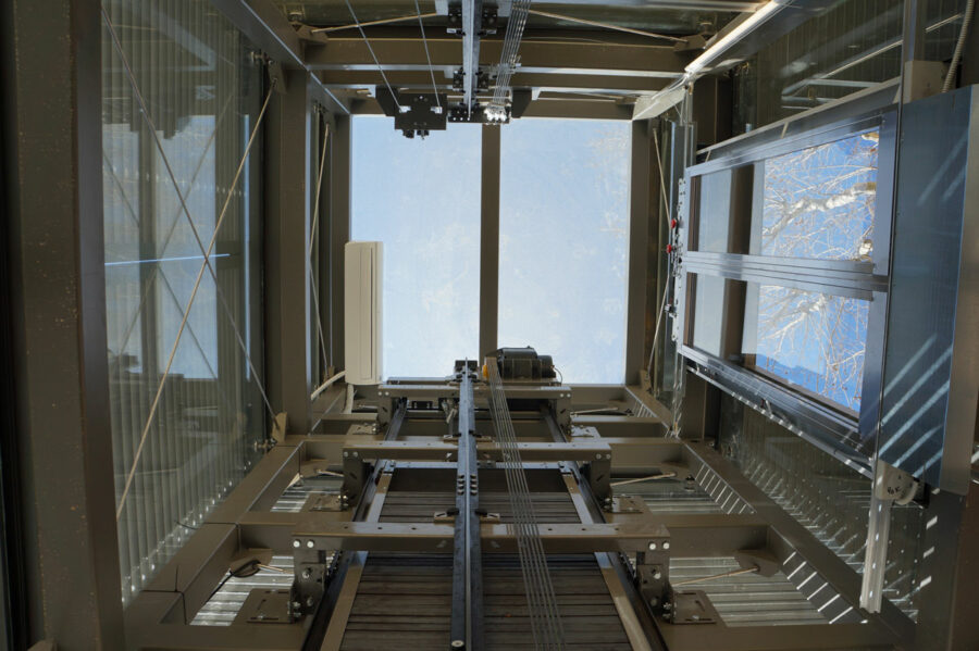 metron-lift-elevator-cabins-doors-metallic-shaft-public-building-bus-station-aix-en-provence-france